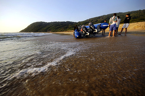 Photo of dolphin boat launch off mamoli beach mozambique, Andrew Woodburn